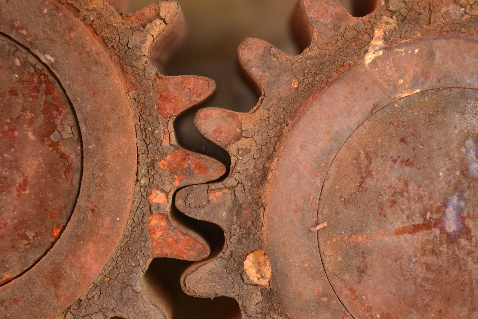 two rusty gears together